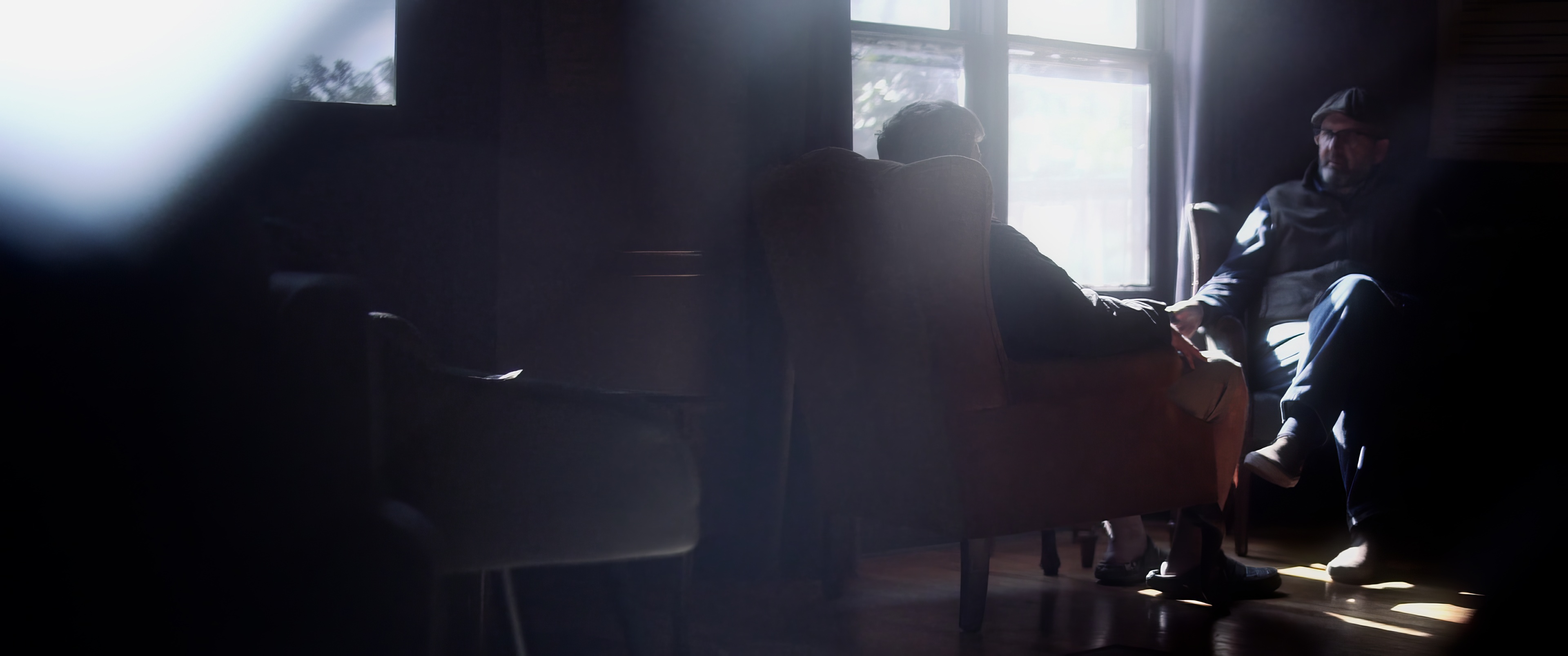 Spiritual direction — chair to chair, backlit